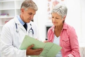 A woman with arthritis during a doctor's appointment